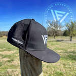 A black hat with a Work Epic logo sitting on a fence