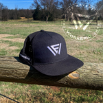 A black hat with a Work Epic logo sitting on a fence